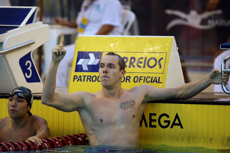 Henrique Rodrigues celebrating a win as a competitive swimmer